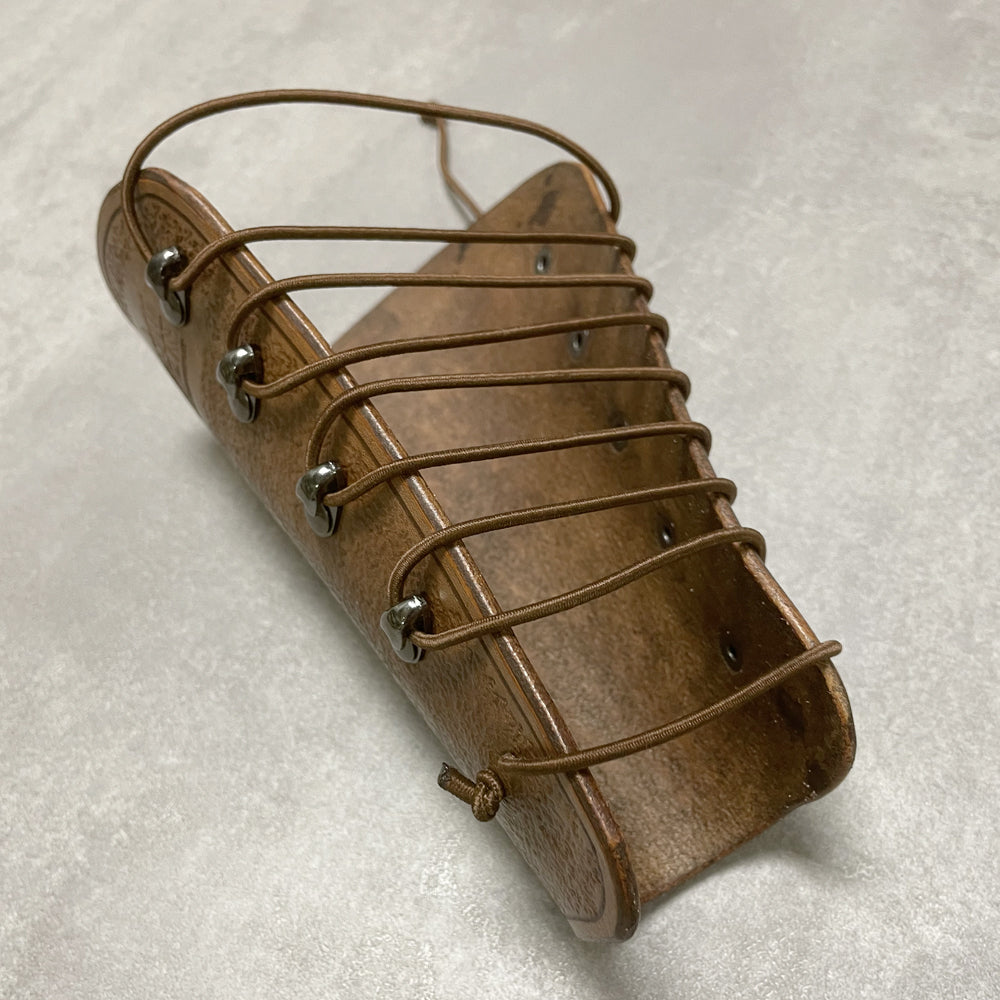 Armschutz-punz.braun3