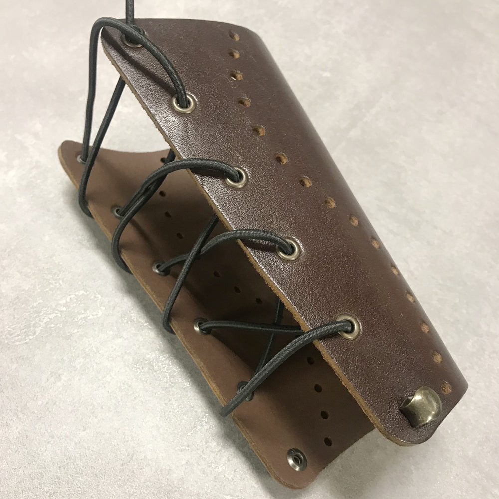 Armschutz_dklbraun_gel.2