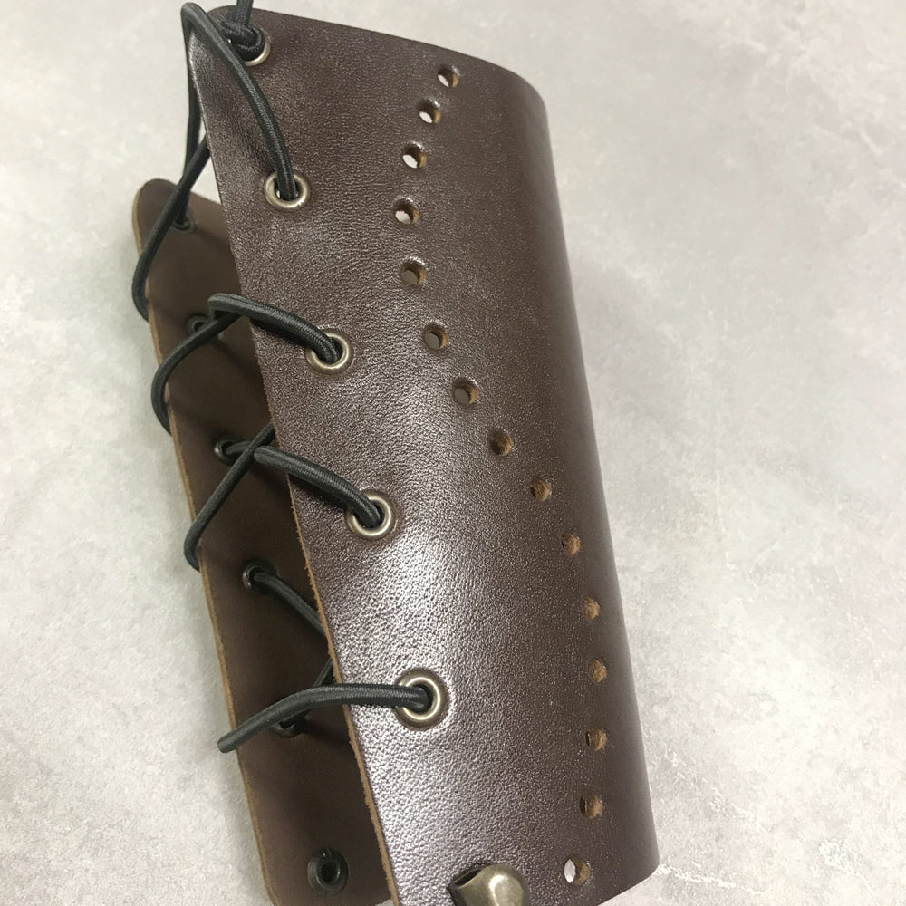 Armschutz_dklbraun_gel.4