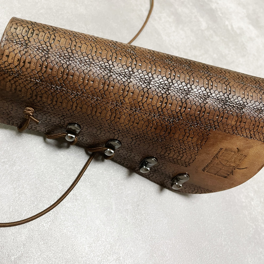 Armschutz_punz.Schlange5